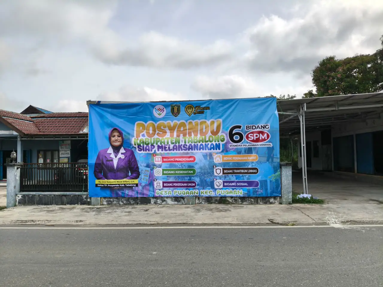 PEMERINTAH DESA PUGAAN PASANG BALIHO POSYANDO 6 BIDANG SPM