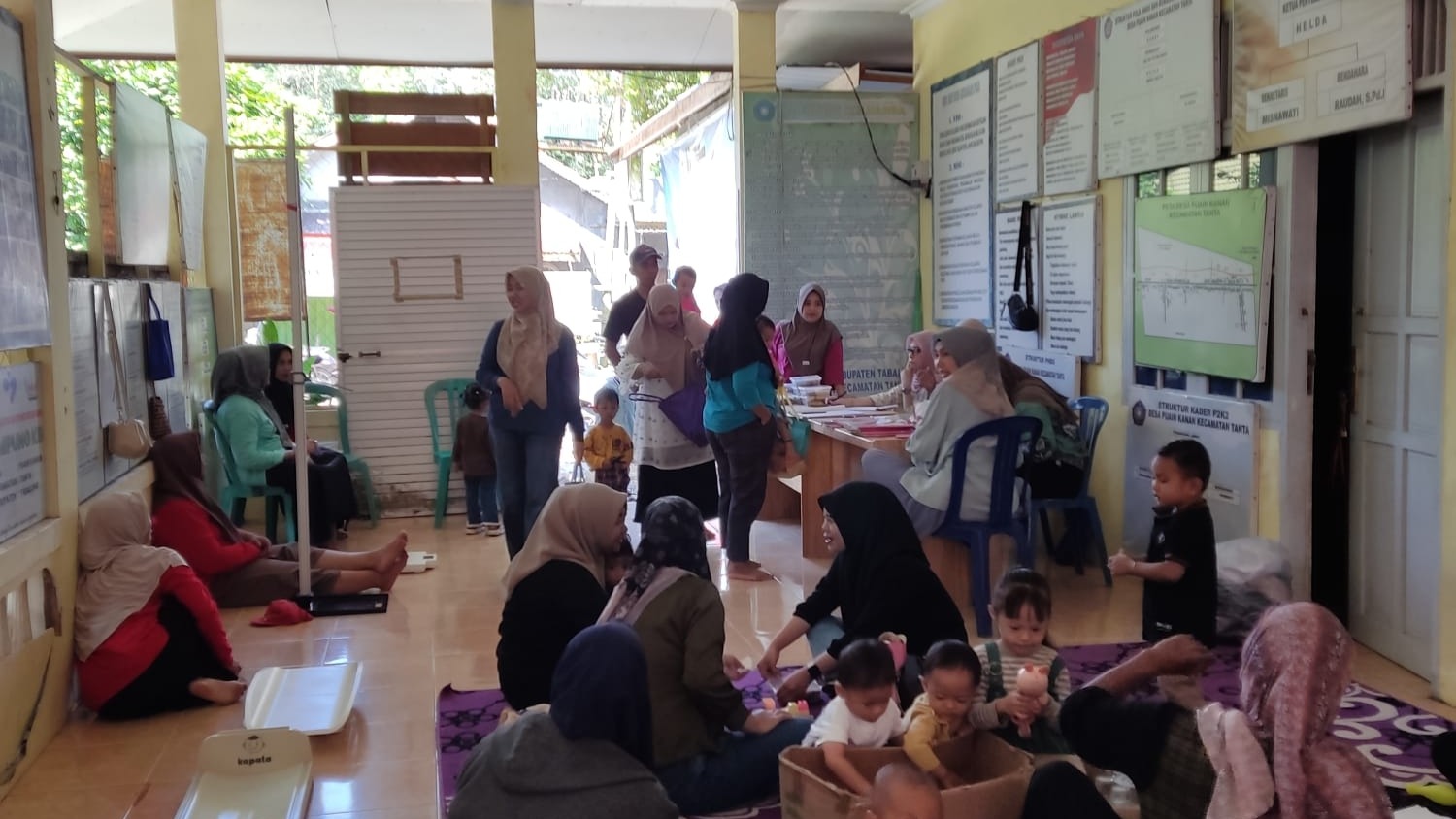 KEGIATAN  MEMANTAU PERTUMBUHAN ANAK (POSYANDU) PUAIN KANAN RT 03