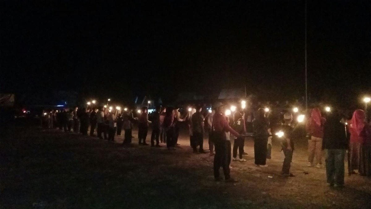 Pawai Obor Taptu Semarak HUT ke-81 Desa Muara Uya