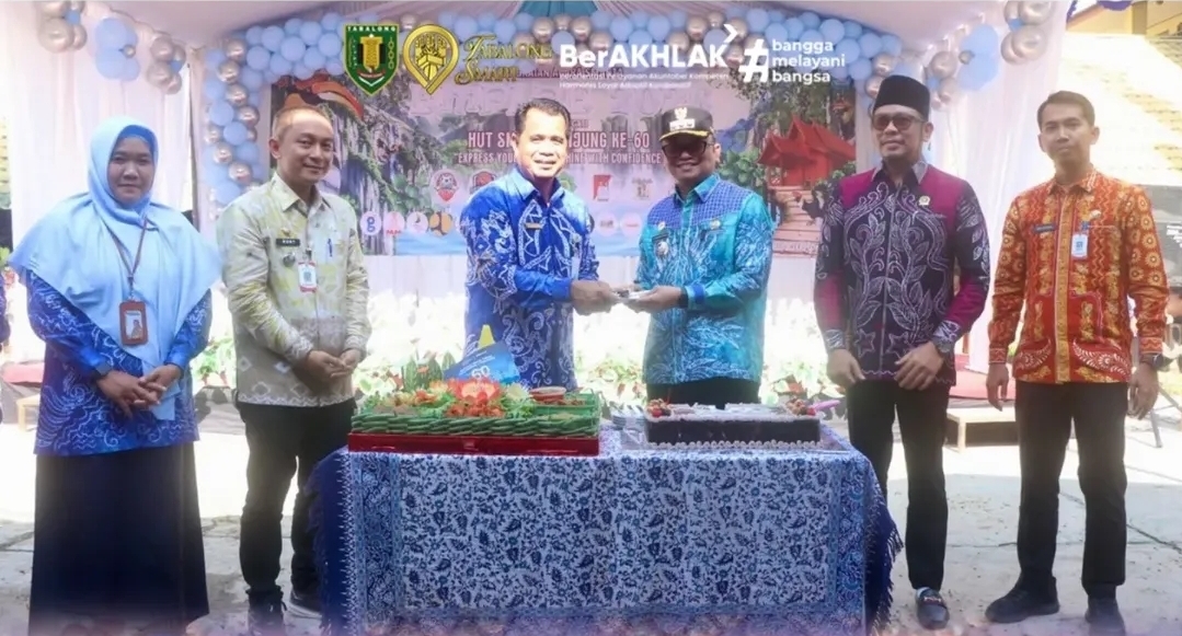 Hadiri Puncak EMPIRE HUT Ke-60 SMAN 1 Tanjung, Bupati Dorong Siswa Manfaatkan Beasiswa 1.000 Sarjana Tabalong SMaRT