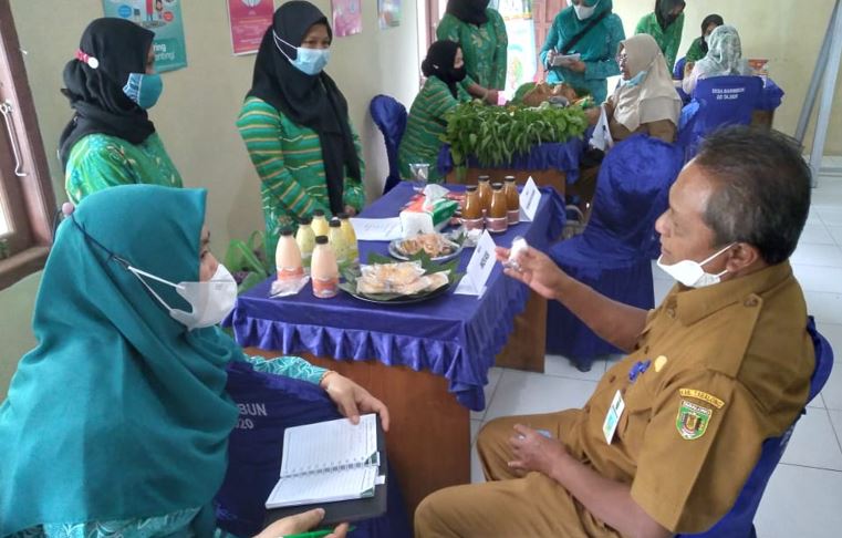 Dinas PMD bersama TIM, Melakukan Penilaian Lomba Posyandu di Desa Tantaringin Kec. Muara Harus