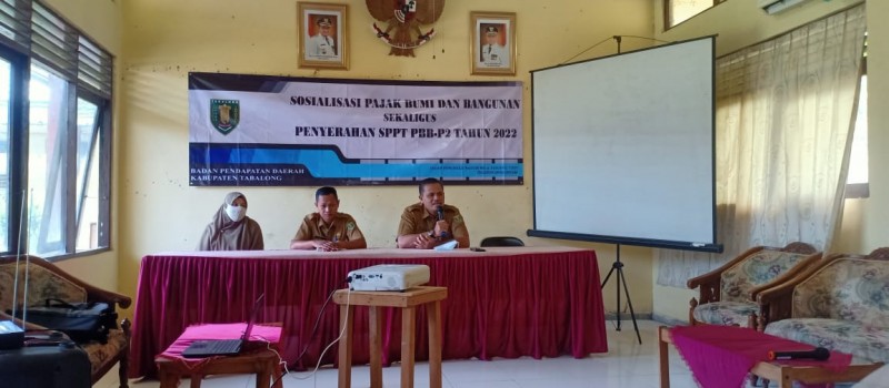 SOSIALISASI PAJAK BUMI DAN BANGUNAN SEKALIGUS PENYERAHAN SPPT PBB-P2 TAHUN 2022