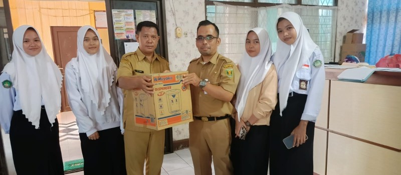 Mengantar doopres serta mengambil spanduk ke kecamatan Murung Pudak